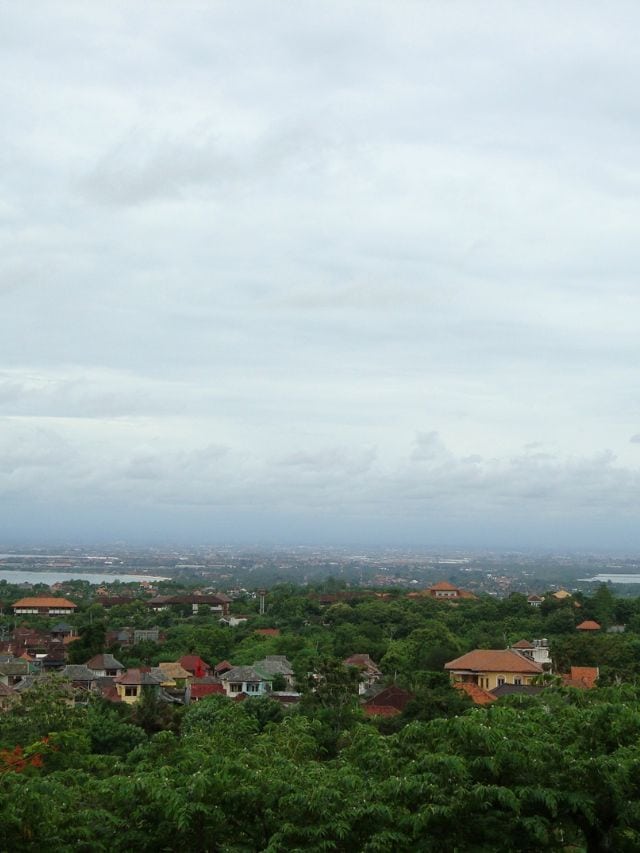 View over Uluwatu village surrounded by lush greenery on Bali’s Bukit Peninsula