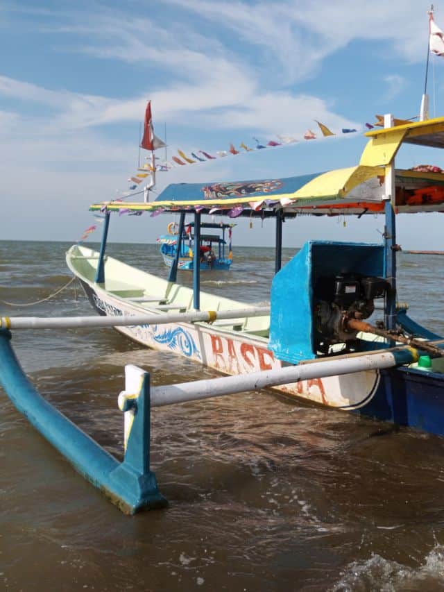 Visit the fishing boats for cultural activities in Medewi Indonesia.