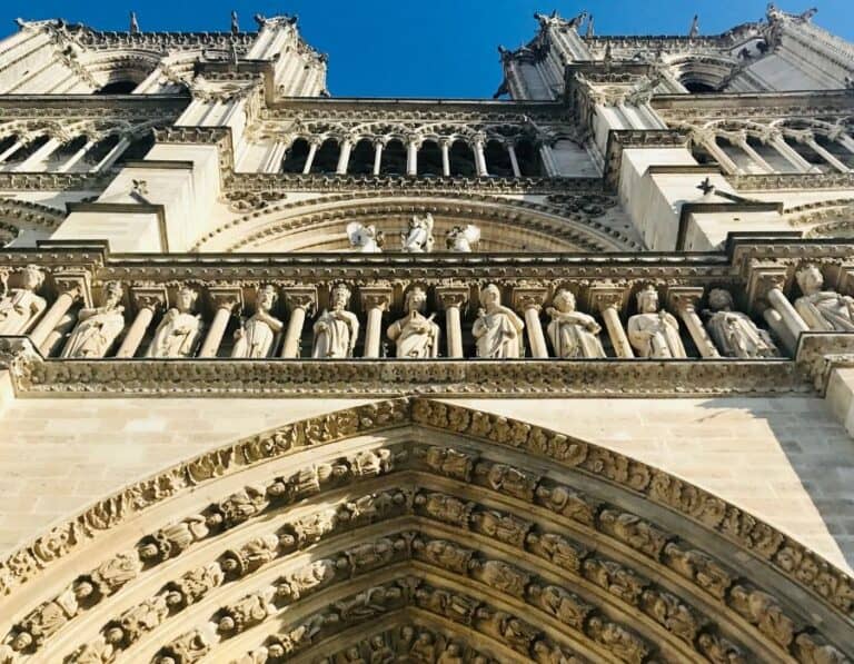 close up of the outside of Notre Dam Cathedral in Paris