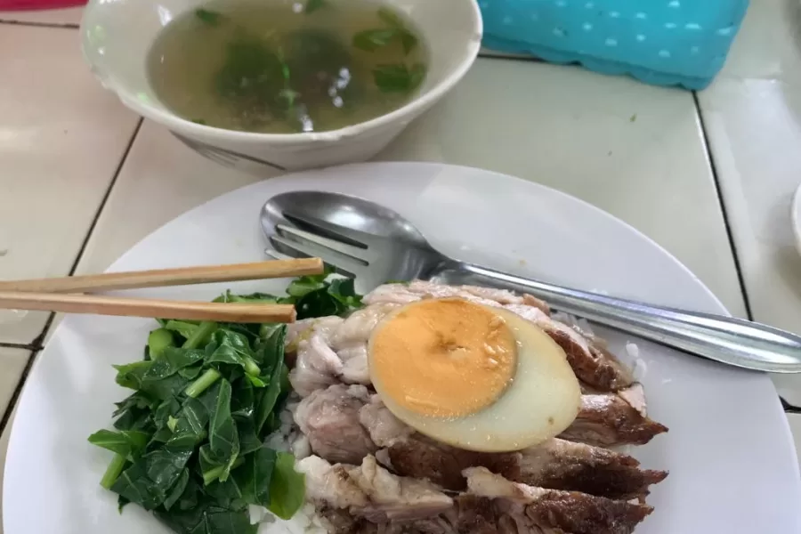How many days in Ayutthaya includes eating at local restaurants which includes this typical meal of rice, greens, pork and a boiled egg!