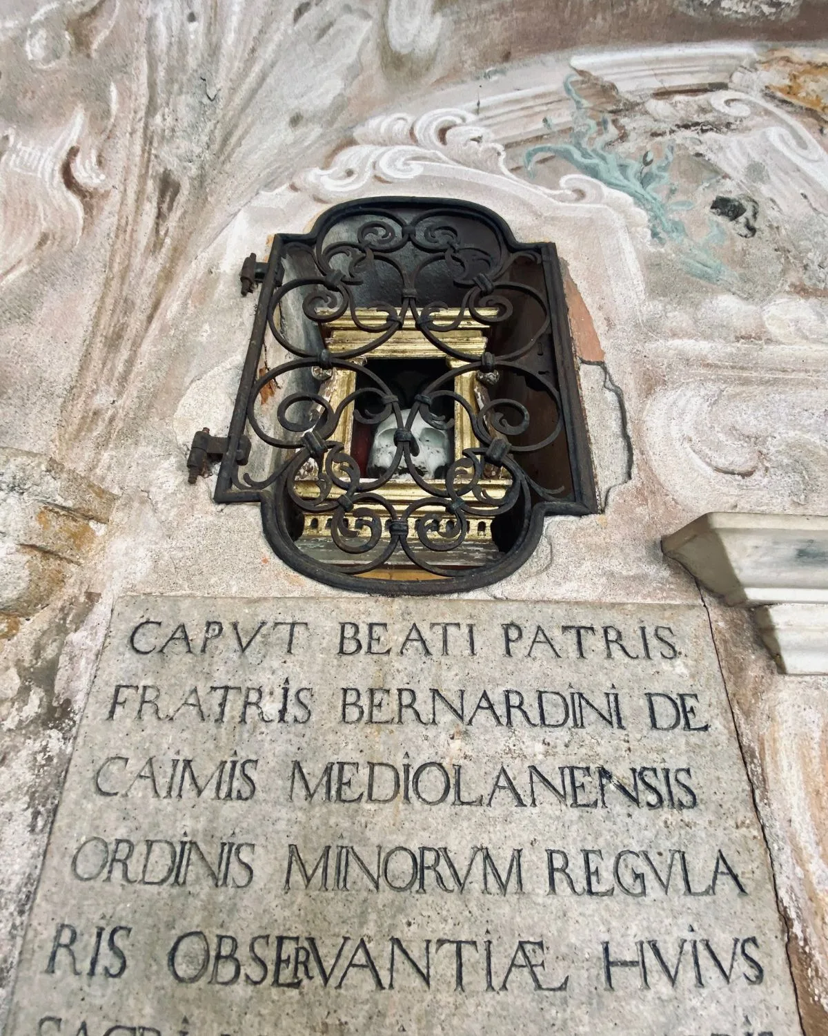 Skull on display at the chapel, Italy.