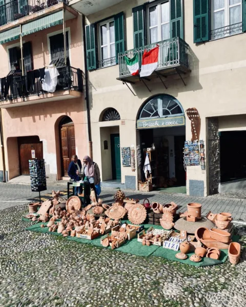 Terracotta figurines for sale on street.