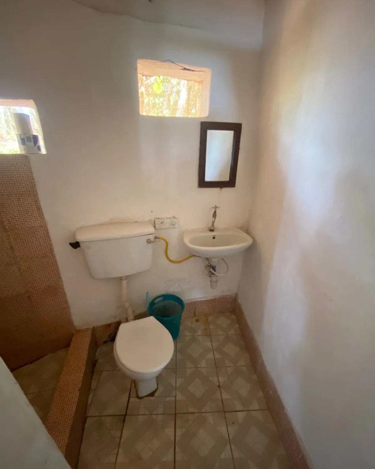 A simple toilet/washroom on the Banana Islands 