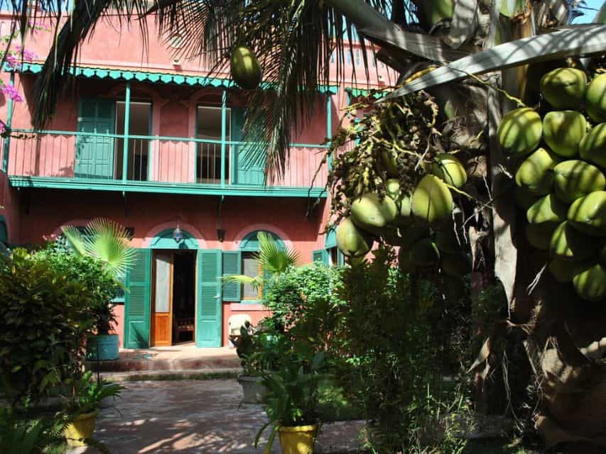 A restored pink colonial building in Saint Louis Sengal is an offbeat location.