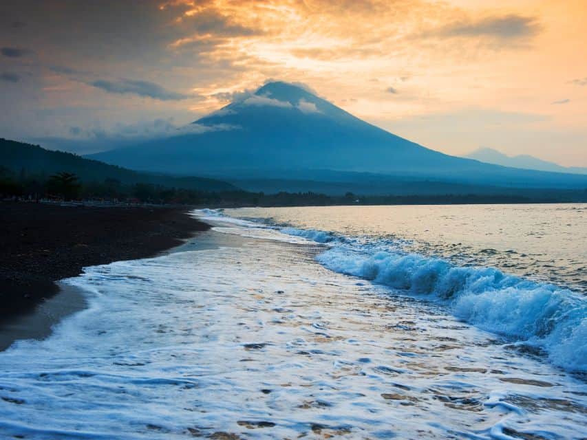 Sunset behind Mount Agung in Amed is worth visiting.