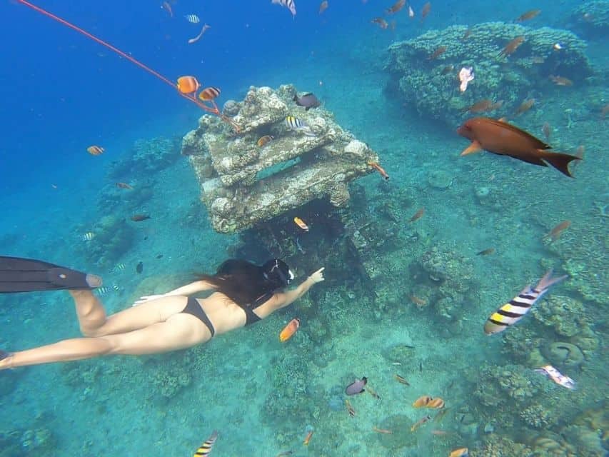 You will spot the underwater temple while snorkelling in Jemeluk Bay, Amed.