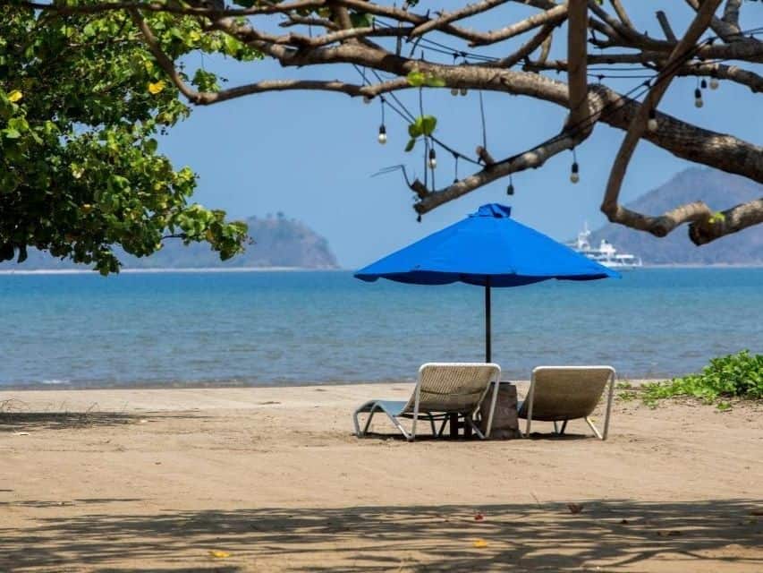 Beach loungers facing the sea at a mid-range hotel in Labuan Bajo