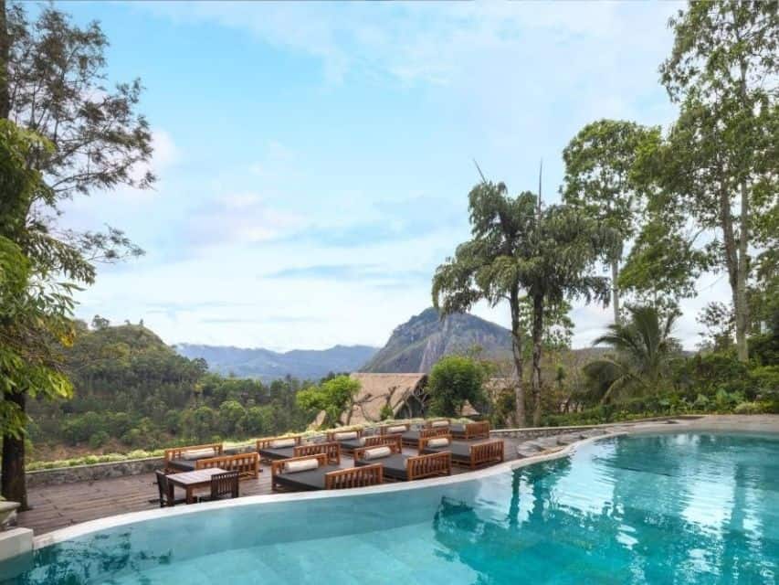 Infinity pool at 98 Acres Resort in Ella with mountain views
