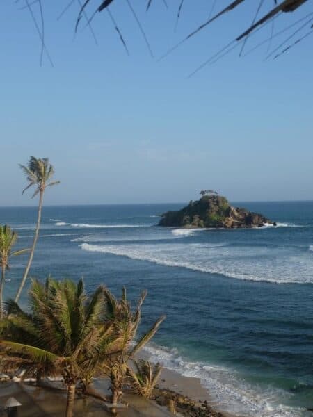 View of Devil’s Rock from Lighthouse Ahangama on Sri Lanka’s south coast