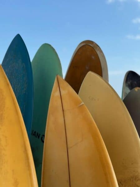 Colourful surfboards lined up near Kabalana on an Ahangama itinerary