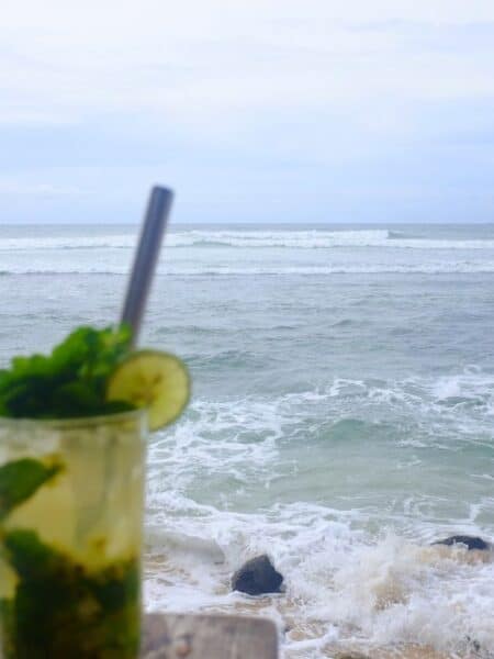 Cocktail overlooking waves at Thelini’s in Ahangama