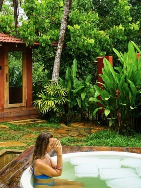 Ice bath surrounded by tropical gardens at Ember in Ahangama