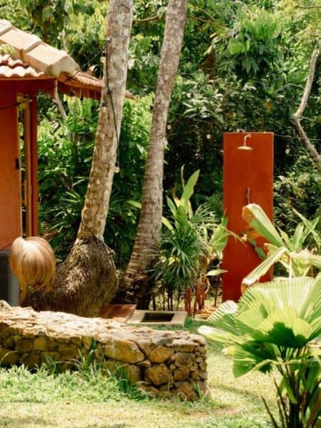 Outdoor shower and sauna garden at Ember, a wellness experience in Ahangama