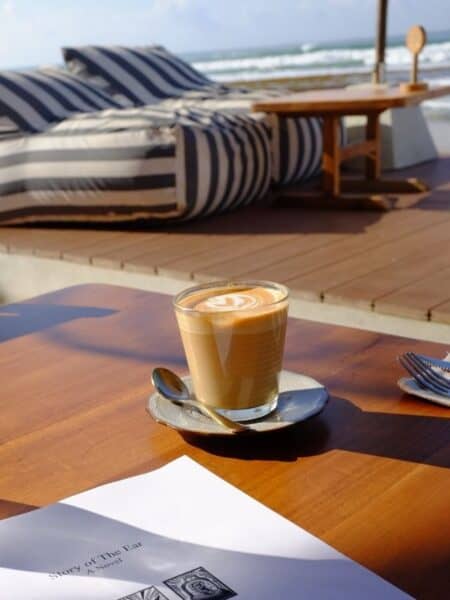 Coffee on a beachside table overlooking the sea in Ahangama.