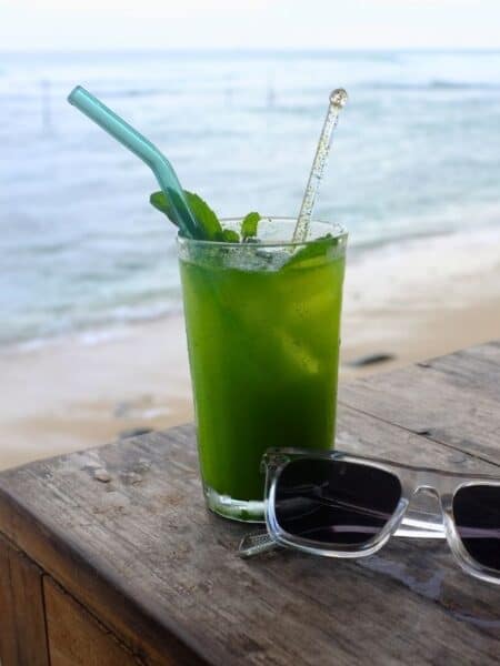 Green cocktail by the beach at one of the oceanfront cafes in Ahangama.