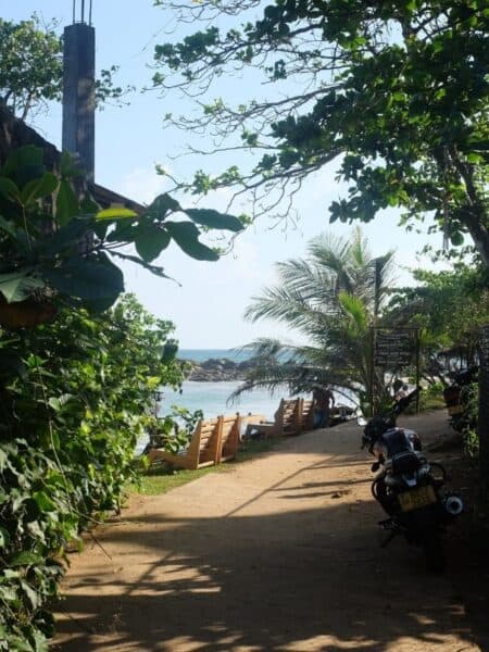 Narrow lane leading down to Turtle Point Batheegama near Dickwella Bay Beach