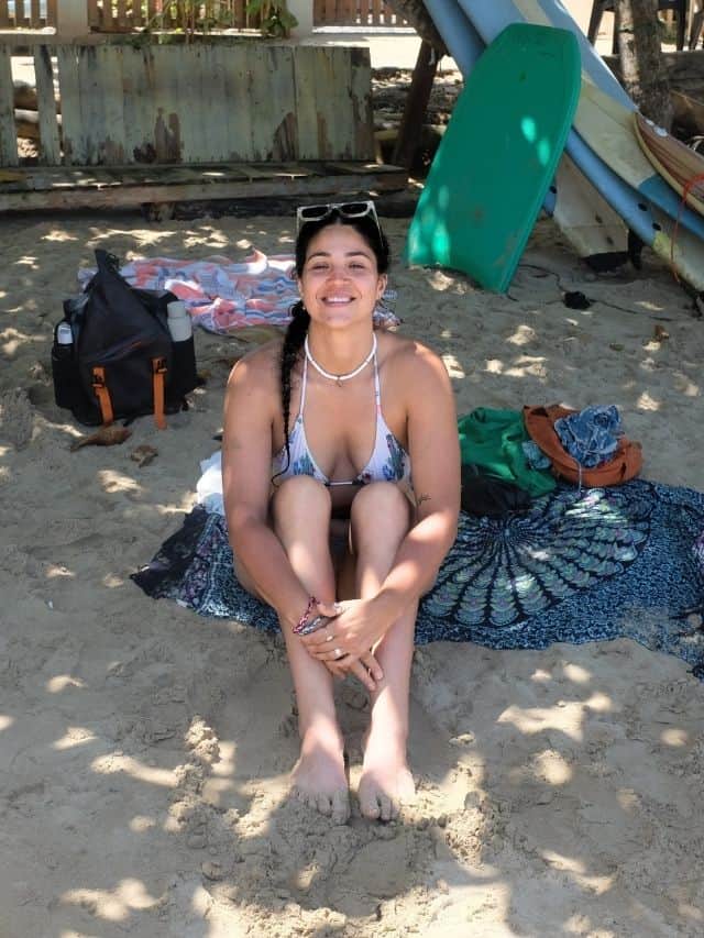 Sitting on the sand under shade at Hiriketiya