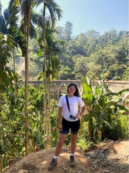 Traveller standing near Nine Arch Bridge in Ella, one of the classic stops on a Sri Lanka 5 days itinerary.