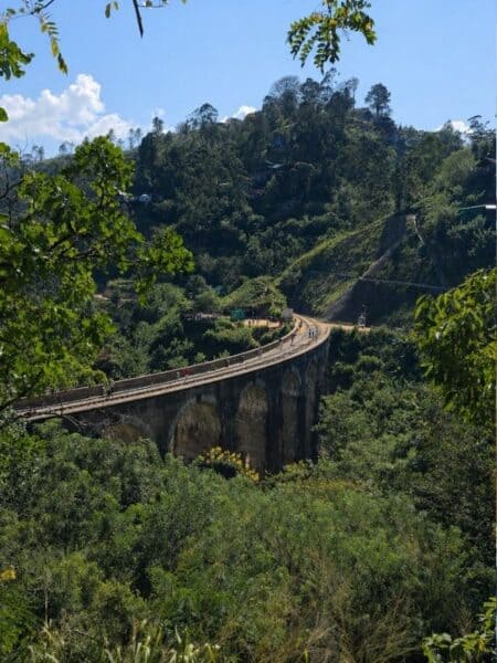Nine Arch Bridge in Ella surrounded by jungle and tea country in Sri Lanka’s hill country.