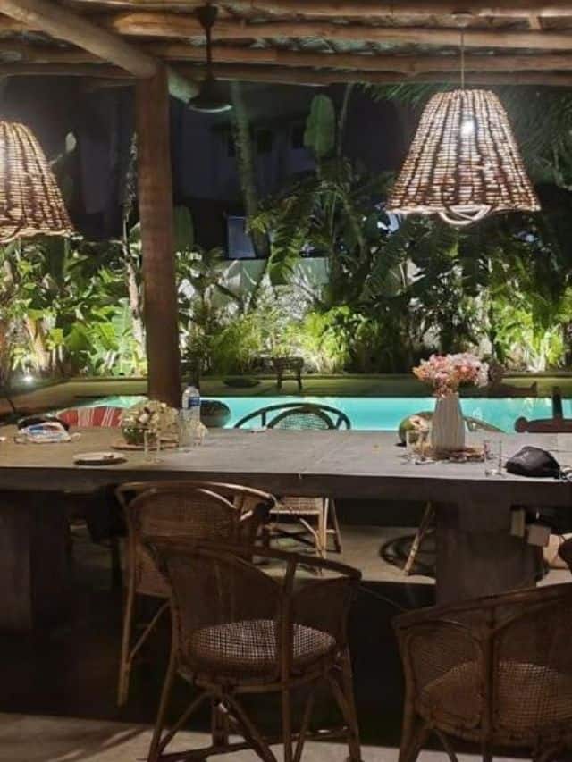 Evening communal table and pool area at 7BD Surf House Ahangama.