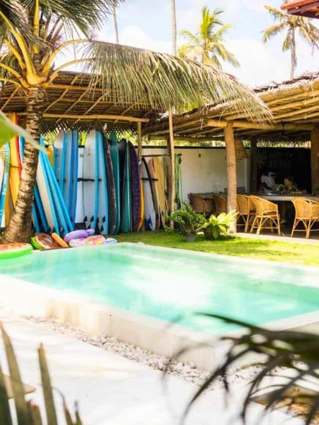 Pool and surfboards at 7BD Surf House in Sri Lanka, a boutique surf stay in Ahangama.