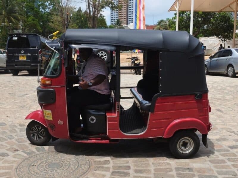 Red tuk-tuk parked during my Colombo City Tour by Tuk Tuk in Sri Lanka