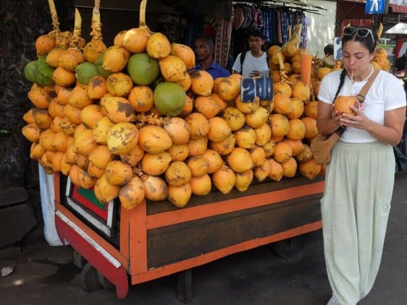 Drinking a fresh coconut during my Colombo City Tour by Tuk Tuk