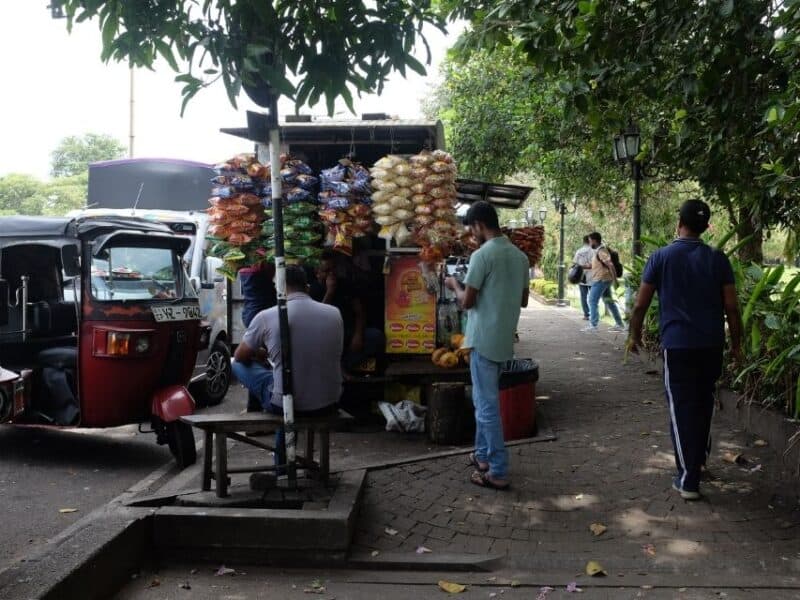 Roadside snack stall and tuk-tuk during a private tuk-tuk city tour in Colombo