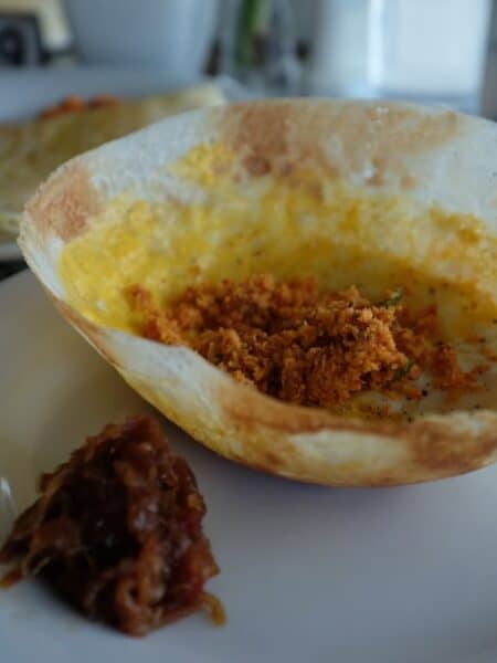 Sri Lankan hopper served at the Marino Beach Colombo breakfast buffet with sambol and curry.