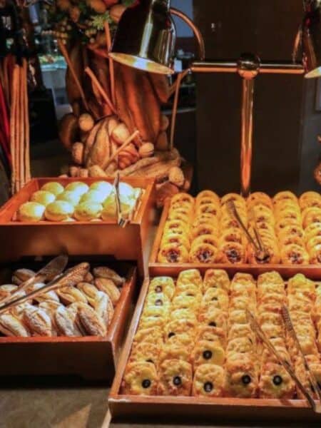 Pastry selection at a Colombo hotel breakfast buffet with sweet and savoury baked goods.