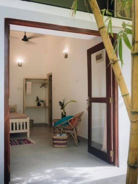 Private room opening onto the garden area at Mellow Hostel in Sri Lanka.