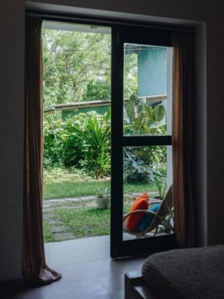 Garden view from a private room at Mellow Hostel near Kabalana Beach.